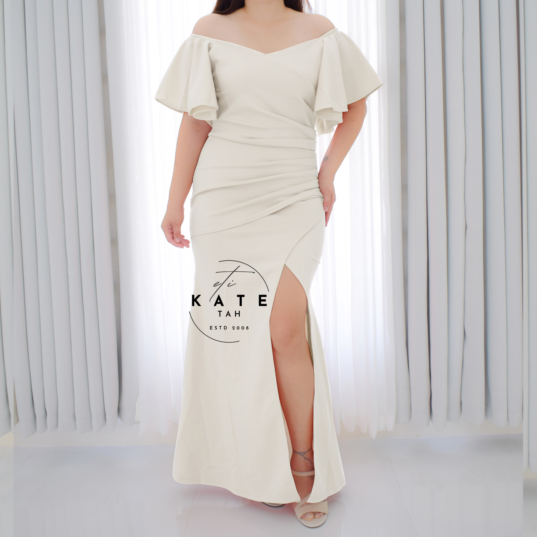 LUCILLE off white.jpg